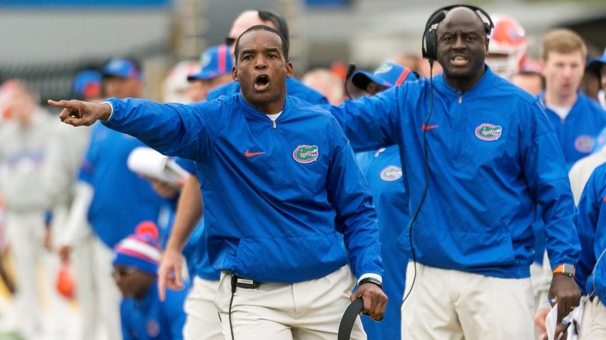 Florida head coach Randy Shannon argues a call with a referee during the first half of an NCAA college football game against Missouri Sat., Nov. 4, 2017, in Columbia, Mo. Missouri won the game 45-16.