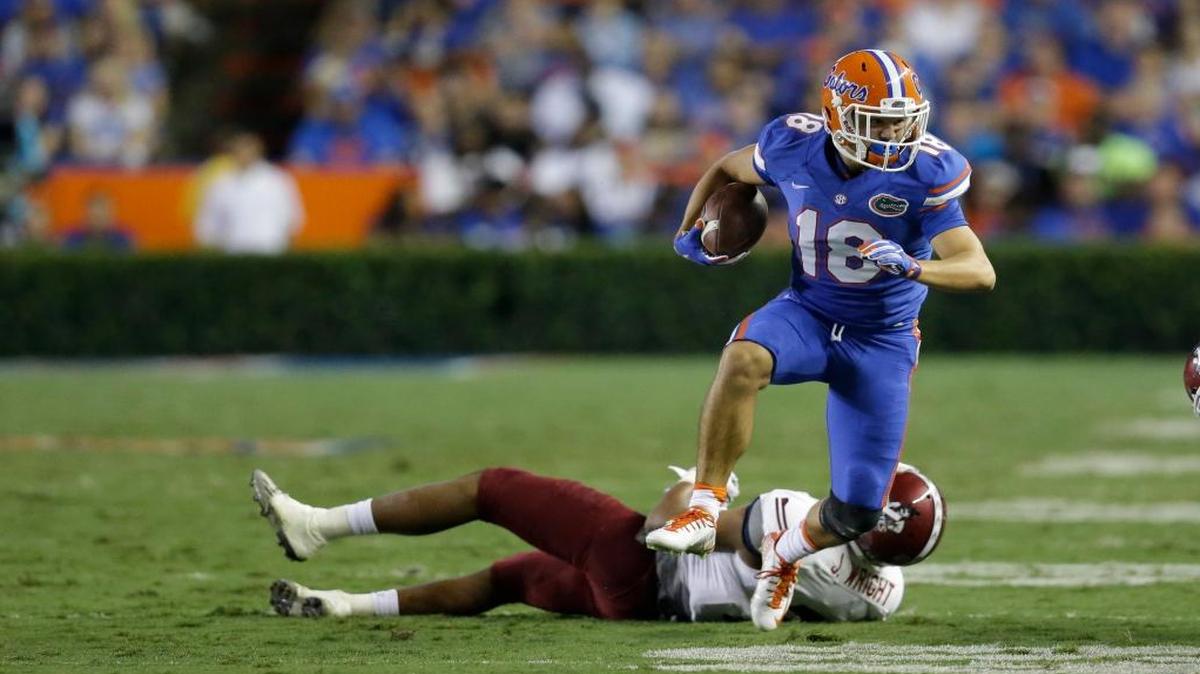 
Florida wide receiver C.J. Worton (18) runs after a reception against New Mexico State during the second half of an NCAA college football game, Saturday, Sept. 5, 2015, in Gainesville, Fla. Florida won 61-13. 

