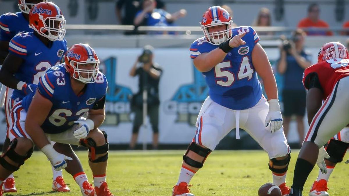 Florida offensive lineman Cameron Dillard (54) calls out a play during a game against Georgia on Saturday, Oct. 31, 2015, in Jacksonville, Fla.