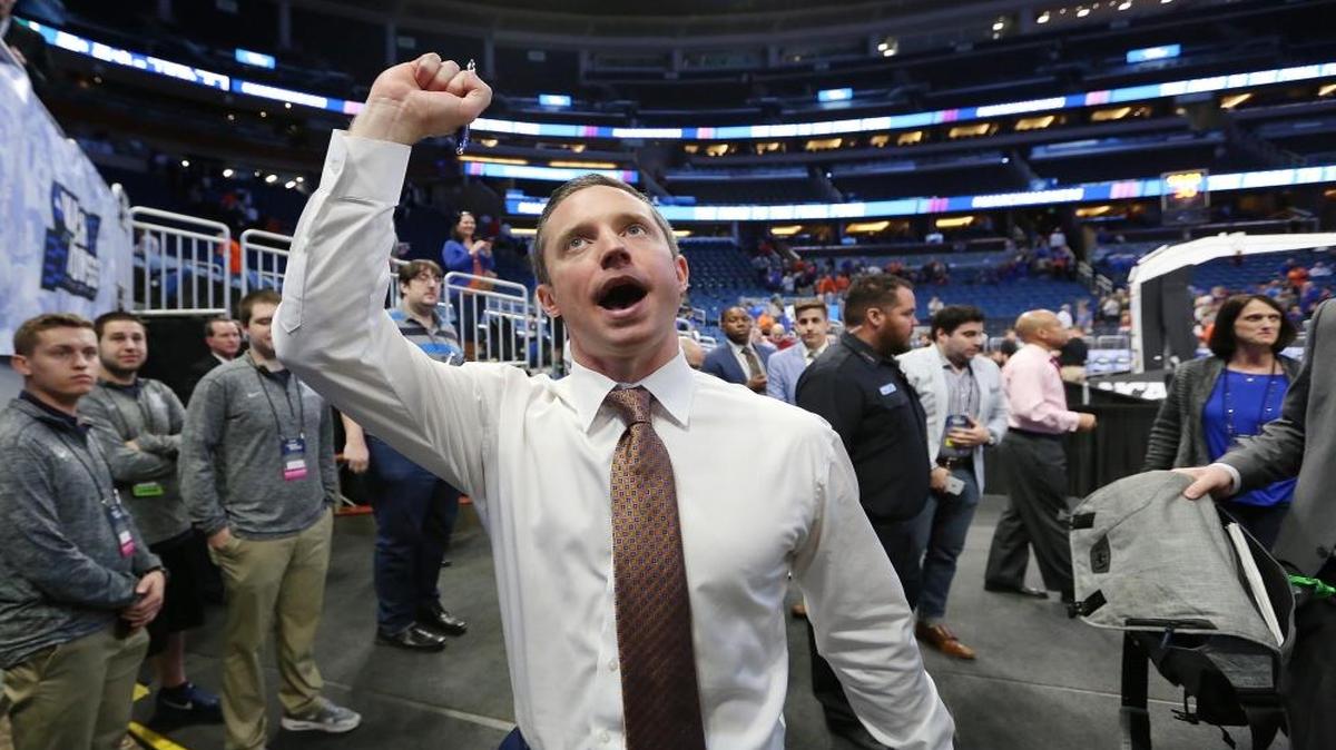 Florida head coach Mike White cheers as he leaves the court after an 80-65 win against East Tennessee State in the first round of the NCAA Tournament on Thurs., March 16, 2017, at the Amway Center in Orlando, Fla.