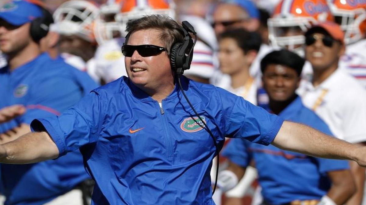 Florida head coach Jim McElwain reacts to a dropped pass by Iowa during the first half of the Outback Bowl NCAA college football game in Tampa, Fla.