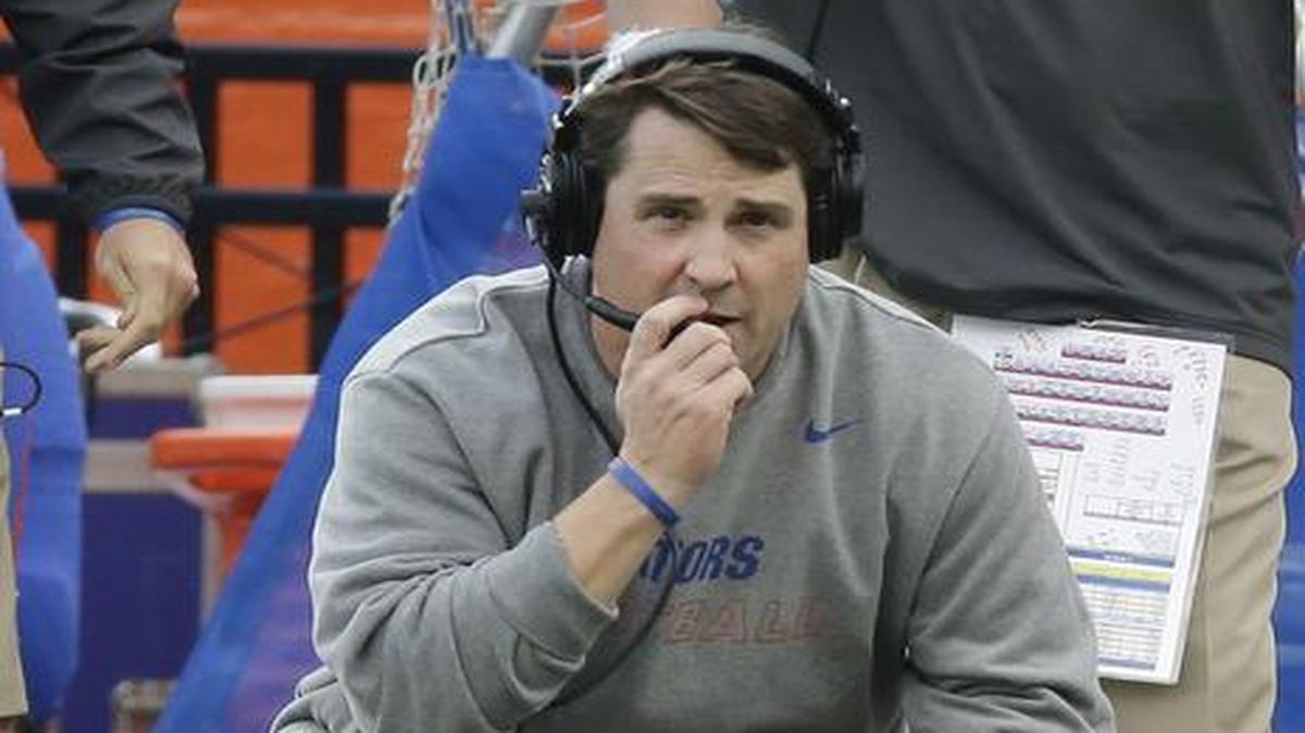 
Florida head coach Will Muschamp watches from the sideline as South Carolina is about to score a touchdown to tie the game and send it in to overtime late in the second half of an NCAA college football game in Gainesville, Fla., Saturday, Nov. 15, 2014. South Carolina won in overtime 23-20. 
