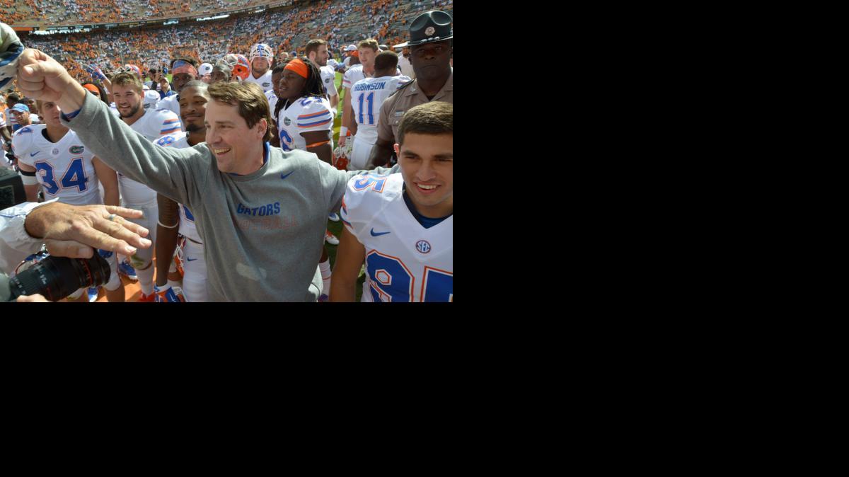
Florida head coach Will Muschamp celebrates with his players after their 10-9 victory over Tennessee in an NCAA college football game at Neyland Stadium, Saturday, Oct. 4, 2014, in Knoxville, Tenn. 
