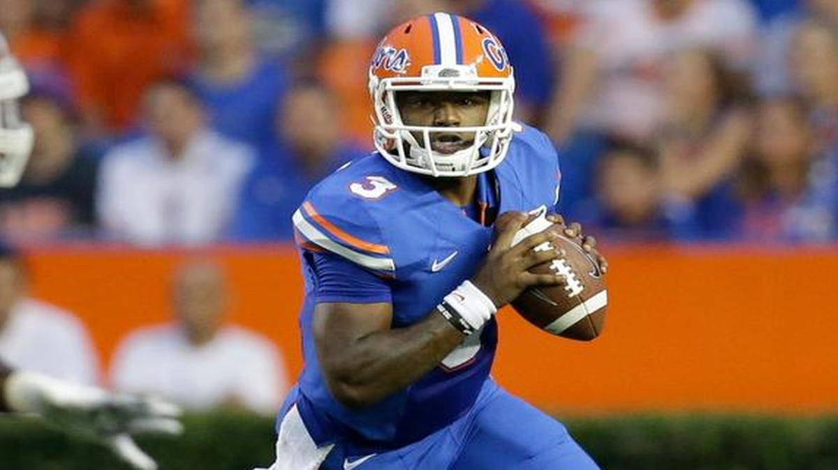 
Florida quarterback Treon Harris scrambles for yardage against New Mexico State during the first half of an NCAA college football game, Saturday, Sept. 5, 2015, in Gainesville, Fla. 
