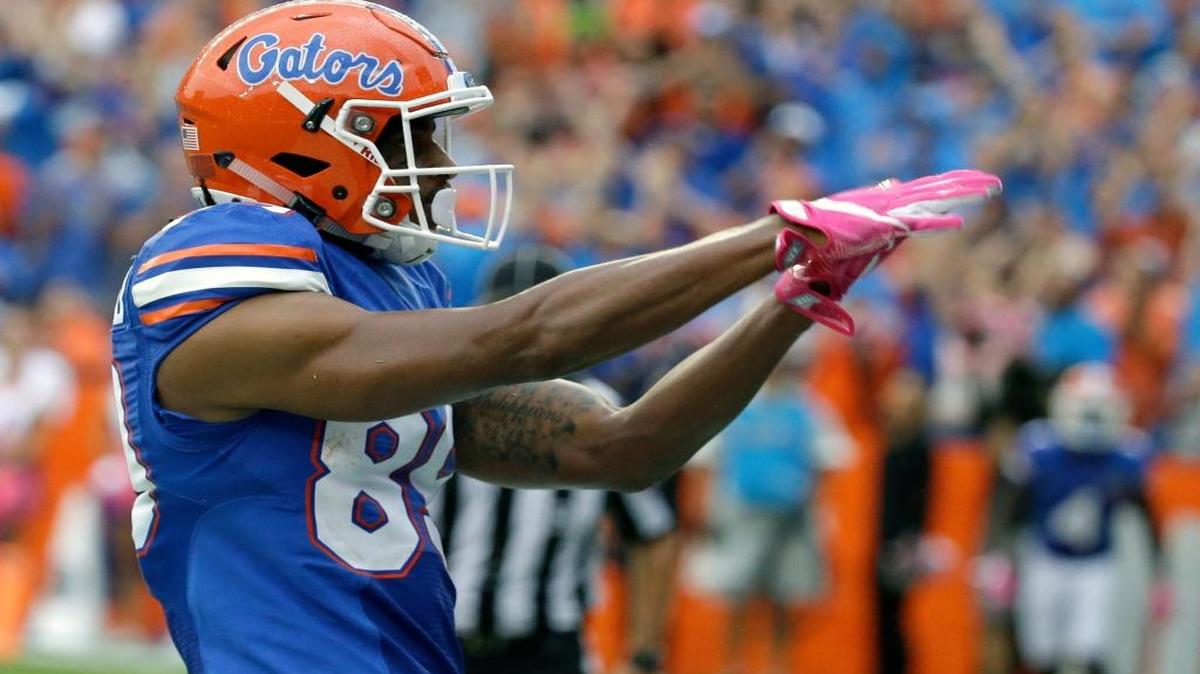 Florida wide receiver Tyrie Cleveland celebrates a 20-yard touchdown against Missouri with fans during the second half of Saturday’s game in Gainesville.