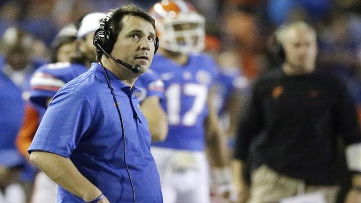 
Florida head coach Will Muschamp looks up at the clock during the second half of an NCAA college football game against Missouri in Gainesville, Fla., Saturday, Oct. 18, 2014. Missouri won 42-13.
