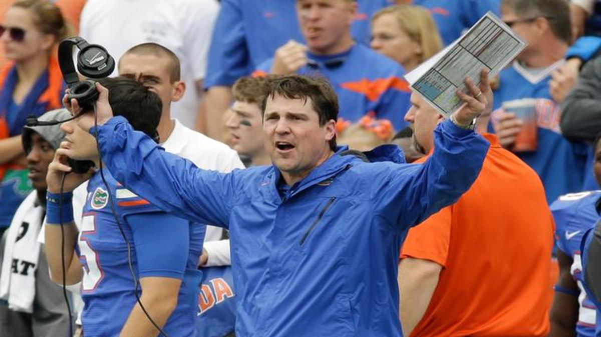 
Florida head coach Will Muschamp waves his arms after disputing a call by officials during the first half of an NCAA college football game against Eastern Kentucky in Gainesville, Fla., Saturday, Nov. 22, 2014. 
