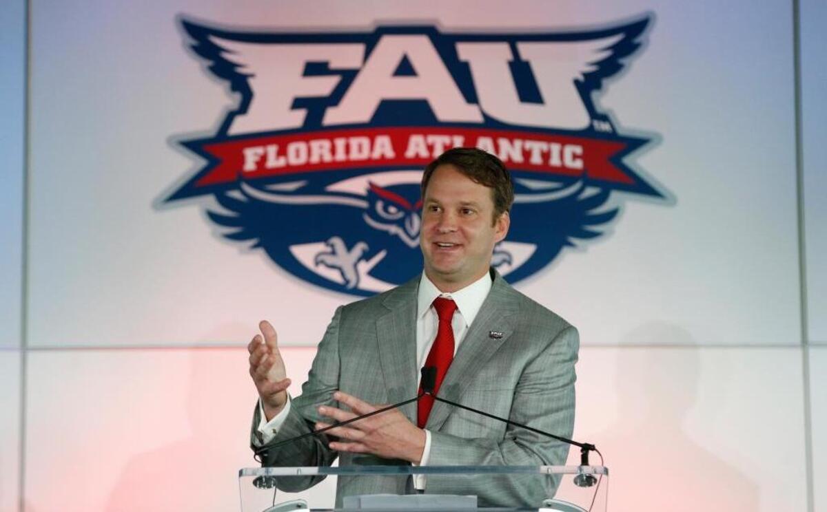 Lane Kiffin gestures as he speaks after being introduced as the new Florida Atlantic head football coach, Tuesday, Dec. 13, 2016, in Boca Raton, Fla. The school announced the move on Twitter on Tuesday, a day after Alabama coach Nick Saban said his offensive coordinator was leaving to take over the Owls. It's the fourth opportunity for Kiffin to be a head coach, after an NFL stint with the Oakland Raiders and college ones at Tennessee and USC.