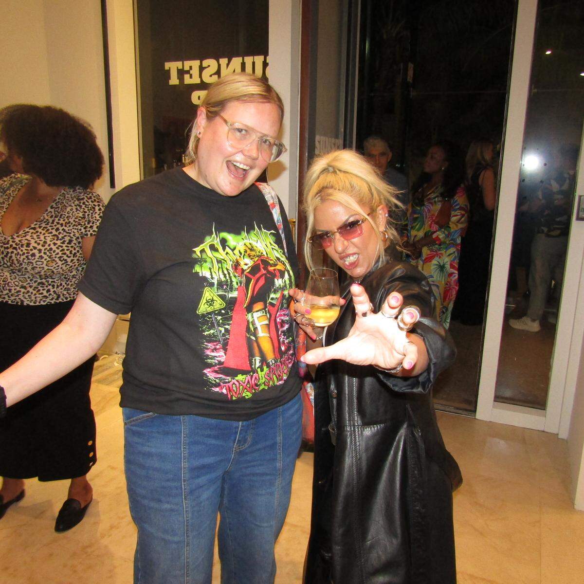 Katherine Pill, senior curator of contemporary art at the Museum of Fine Arts in St. Petersburg, is a fan of the artwork and pro wrestling work of AEW women’s champ “The Toxic Spider” Thekla at the Sunset Flip art exhibit in the Miami Design District.