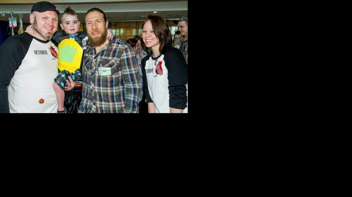 
During the day on March 9, WWE superstar Daniel Bryan visited the Children’s Hospital of Pittsburgh of UPMC. WWE Monday Night Raw was March 9 from the CONSOL Energy Center in Pittsburgh, where in 2013 Connor Michalek, a 7-year-old cancer patient at the Children’s Hospital of Pittsburgh of UPMC, met many WWE superstars and divas including his hero, Daniel Bryan. Michalek, a passionate WWE fan who died last year at age 8, is the first recipient of The Warrior Award, named after WWE Hall of Famer the Ultimate Warrior. The honor will be bestowed each year at the WWE Hall of Fame Induction Ceremony.

