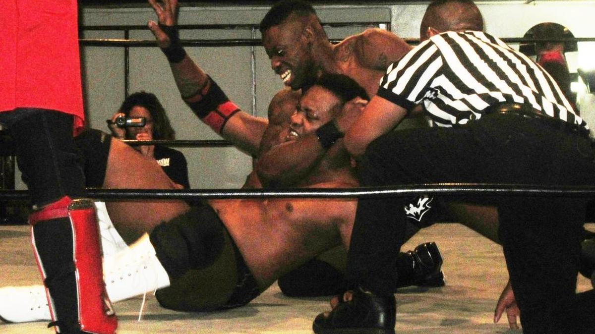 South Florida’s own Reggie Rhythm headlocks former tag team partner Sweet Johnny Velvet during a WXW show at the Polish American Club in Miami. WXW, which returns to the Polish American Club on Nov. 7, is run by WWE Hall of Famer Afa the Wild Samoan.