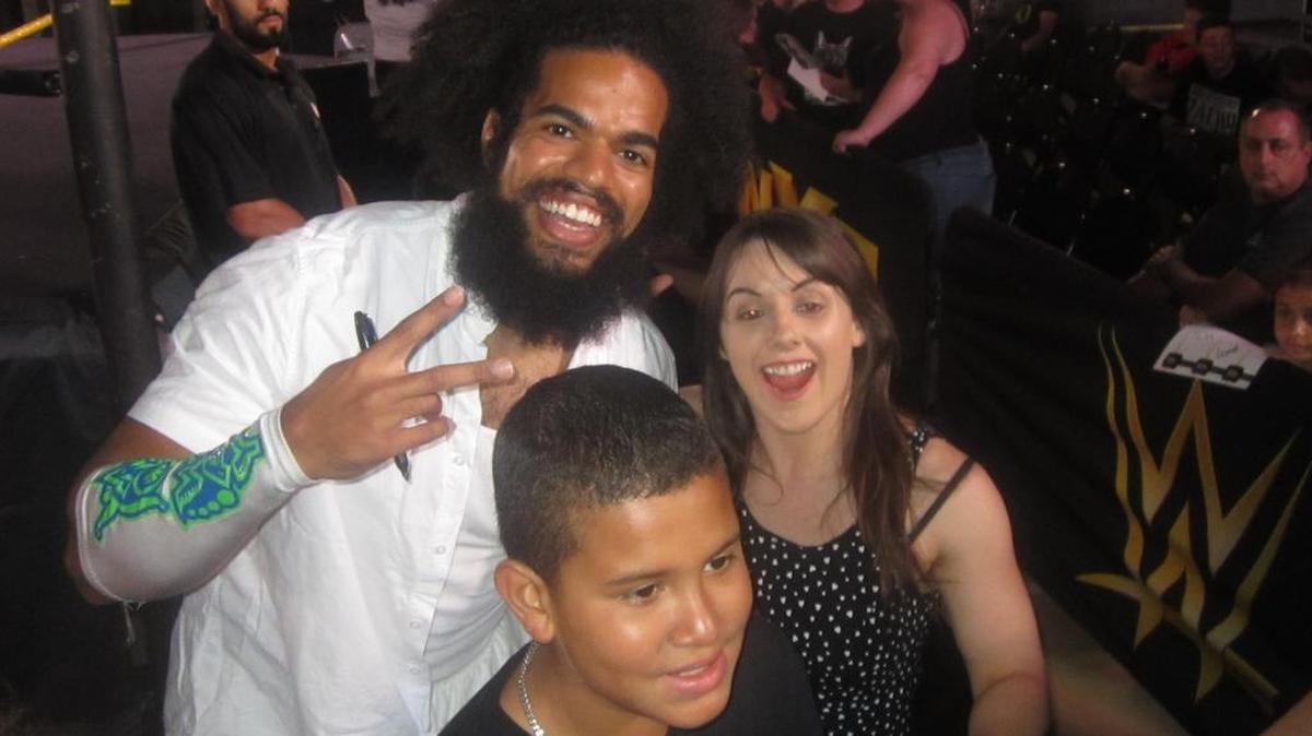 NXT superstars No Way Jose and Nikki Glencross pose for a photo with a fan before a WWE NXT show at the Havert L. Fenn Center in Fort Pierce. NXT returns to the Havert L. Fenn Center on Saturday, Aug. 13.