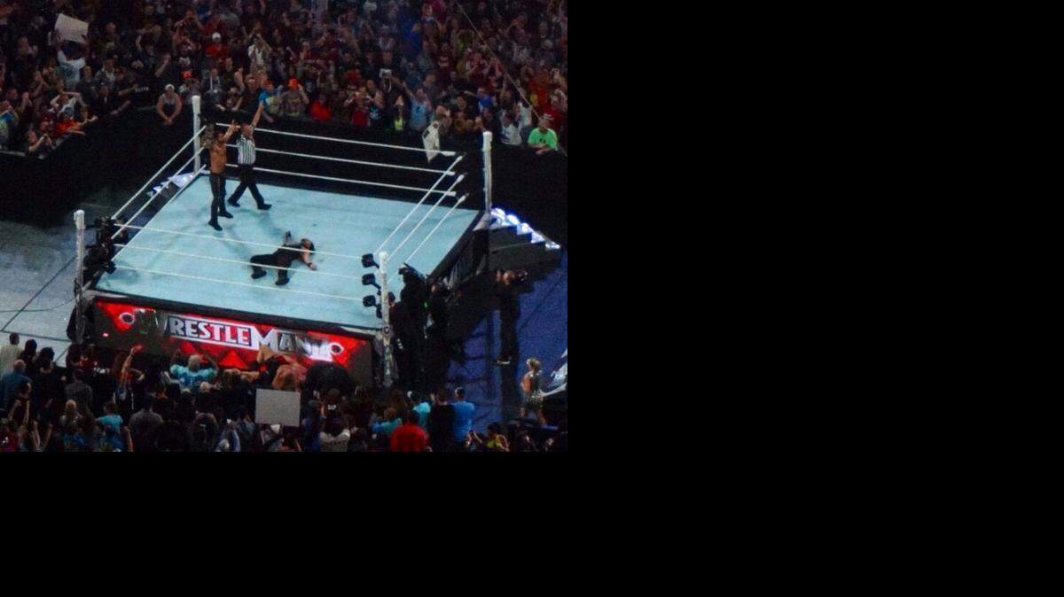 
Seth Rollins cashes in his Money in the Bank briefcase to win the WWE World championship during WWE WrestleMania 31 on Sunday, March 29 on pay-per-view and WWE Network from Levi’s Stadium in Santa Clara, Calif.
