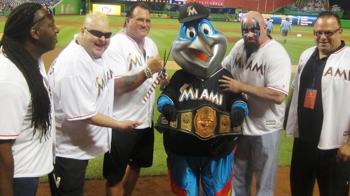 WWE Hall of Famer Booker T, Nasty Boy Brian Knobbs, Brutus the Barber Beefcake with shears, The Warlord of the Powers of Pain and Nasty Boy Sags join Billy the Marlin during the Legends of Wrestling Night on Saturday, Aug. 27 at Marlins Park.