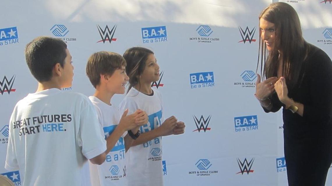 WWE Chief Brand Officer Stephanie McMahon talks shop with fans Freddy Alvarez, Jeronimo Cheff-Velez and Camila Evans of the Boys & Girls Clubs of Miami-Dade, after a Be a STAR anti-bullying rally on Monday, Jan. 25 at the Hank Kline Boys & Girls Club in Miami. The Boys & Girls Clubs of America and WWE debuted a national partnership for bullying prevention during the South Florida rally through Be a STAR (Show Tolerance And Respect).