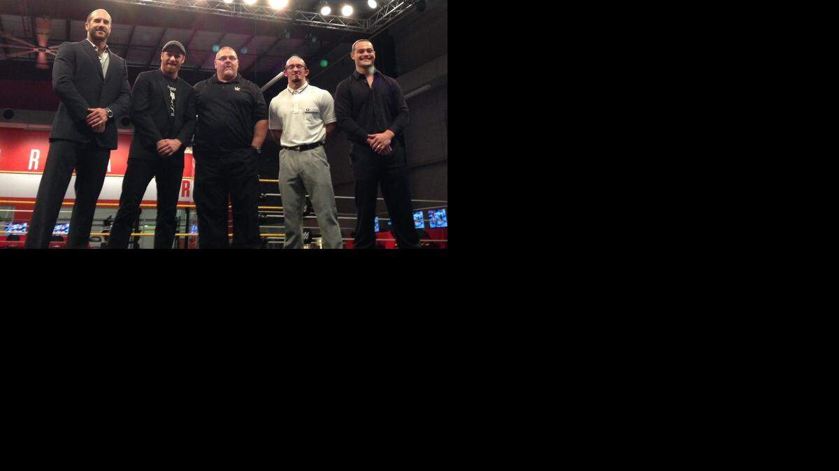 
Cesaro, Sami Zayn, Bill Demott, Adrian Neville and Bo Dallas pose for a photo opportunity during the “WWE 2K15” press event at the WWE Performance Center in Orlando. 
