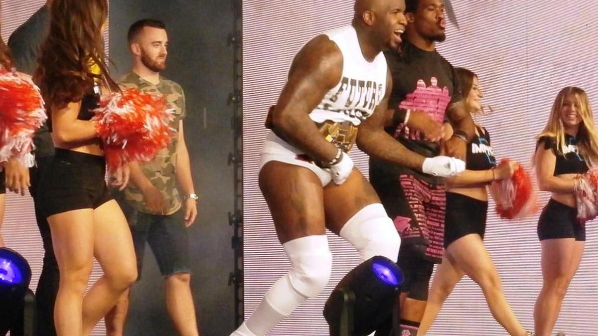 Cheerleaders cheer for the tag team of NFL free agent DeAngelo Williams (black and pink T-shirt) and NFL alum Moose (Quinn Ojinnaka) during the Slammiversary XV pay-per-view. The 15th anniversary event was presented by GFW/Impact Wrestling -- under the Anthem Sports & Entertainment banner -- on Sunday, July 2 from Universal Studios Florida in Orlando.
