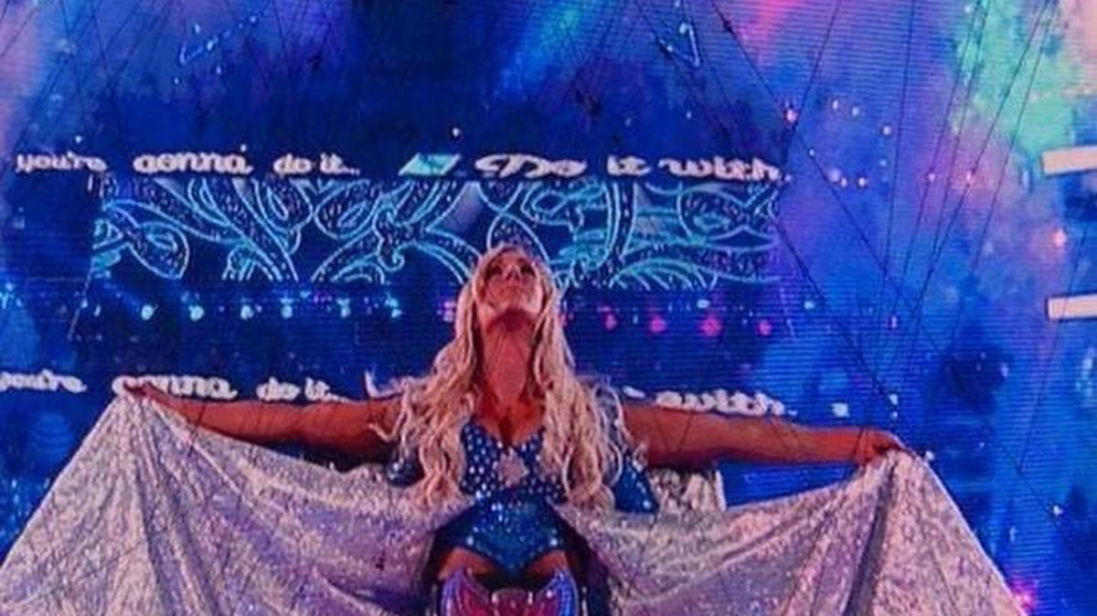 WWE Superstar Charlotte Flair during her WrestleMania 32 entrance in 2016 at AT&T Stadium in Arlington, home of the NFL Dallas Cowboys. One of her goals is to main event WrestleMania.