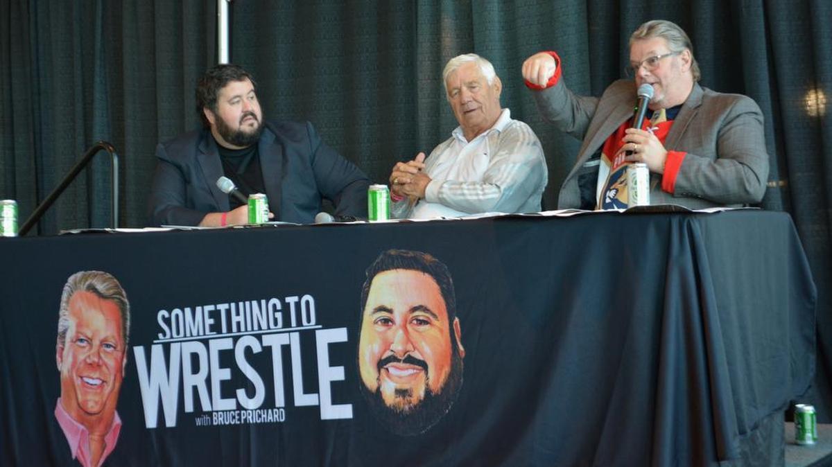 WWE Hall of Famer Pat Patterson (center) was the surprise guest for a live pro wrestling talk show -- hosted by Bruce Prichard (WWE alum Brother Love) and Conrad Thompson (left) -- during Florida Panthers Pro Wrestling Day on Saturday afternoon, March 17 at the BB&T Center in Sunrise. Prichard and Thompson co-host the award-winning, weekly podcast Something to Wrestle with Bruce Prichard.