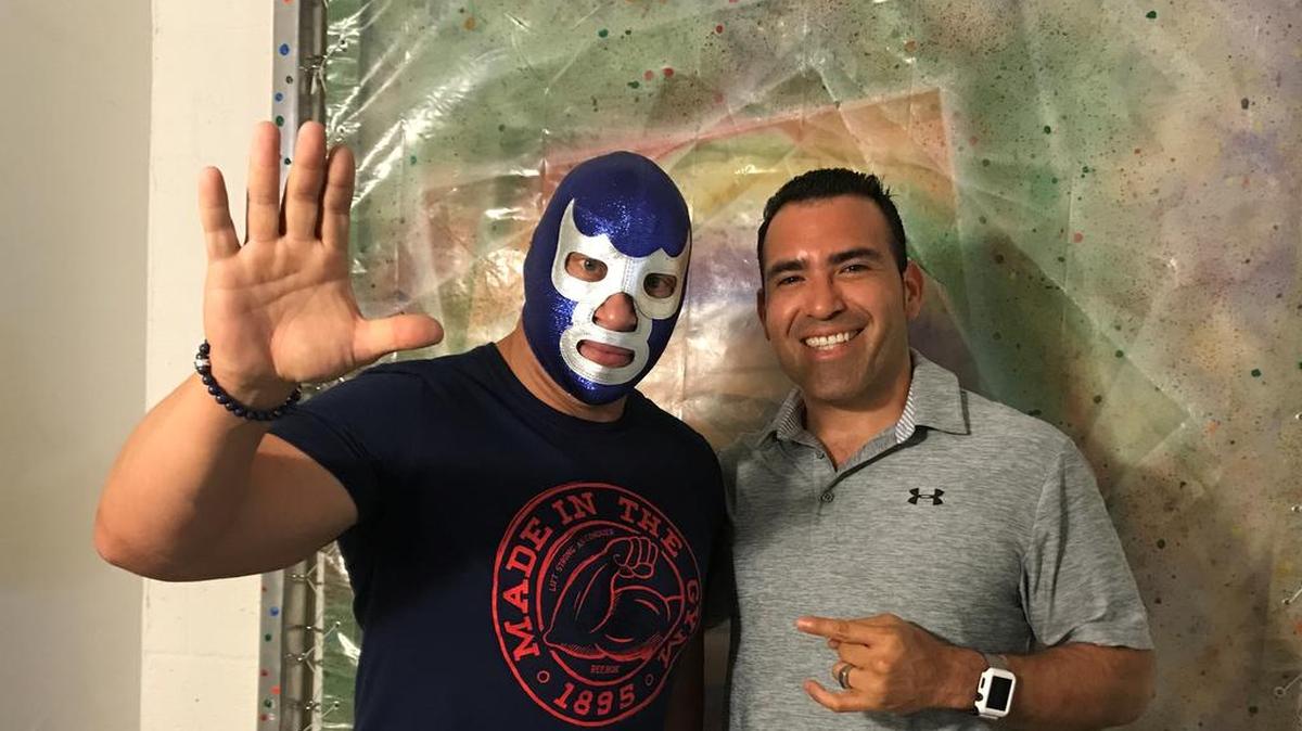 Blue Demon Jr. (left) with Rodolfo Roman of The Roman Show during Coastal Championship Wrestling’s Cinco do Mayo show on Friday, May 5 at COYO Taco in Wynwood-Miami.