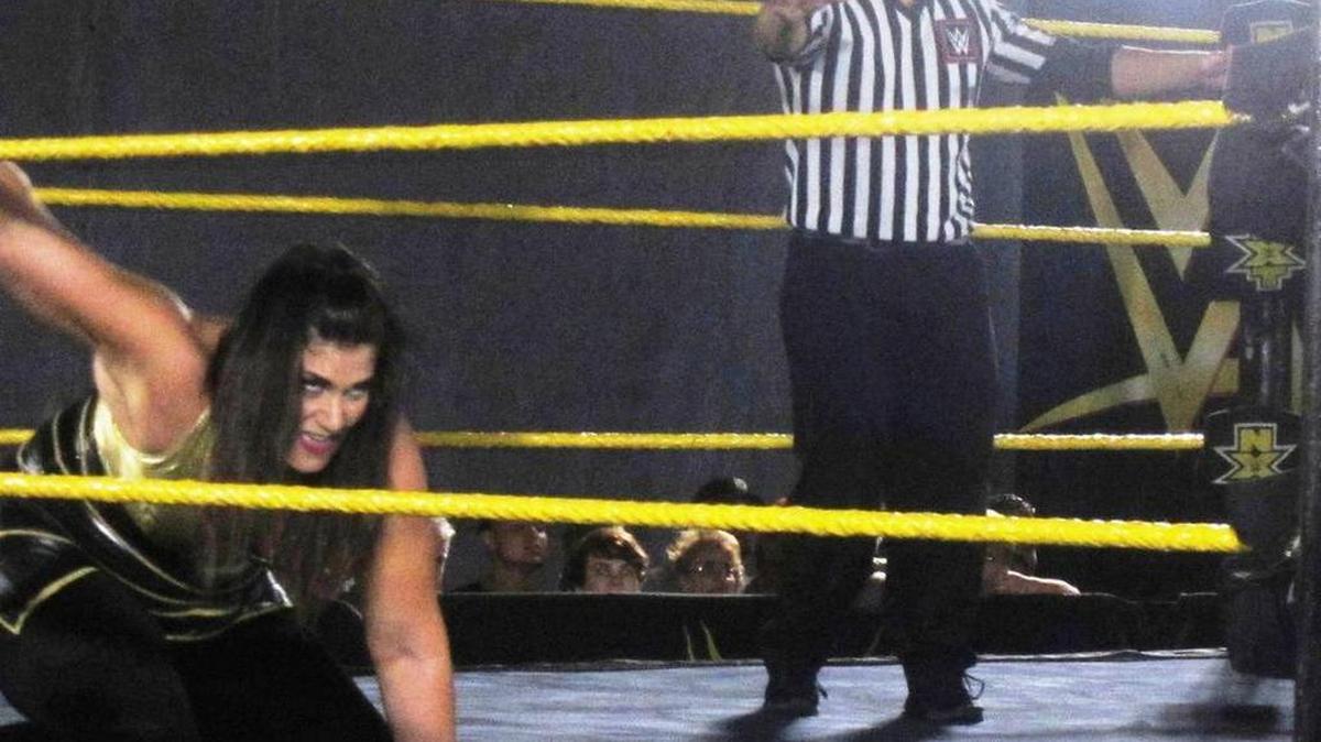 NXT Superstar Sage Beckett, formerly Florida indie wrestler the Amazon Andrea, is competing in the WWE Mae Young Classic, which begins broadcasting Monday, Aug. 28 on the WWE Network. Beckett, who was also Rosie Lottalove, Sister Ophelia and Betsy Ruth, was trained at the Dudley Boyz’s Team 3D Academy in Kissimmee, near Orlando. Also pictured is NXT referee Tom Castor.