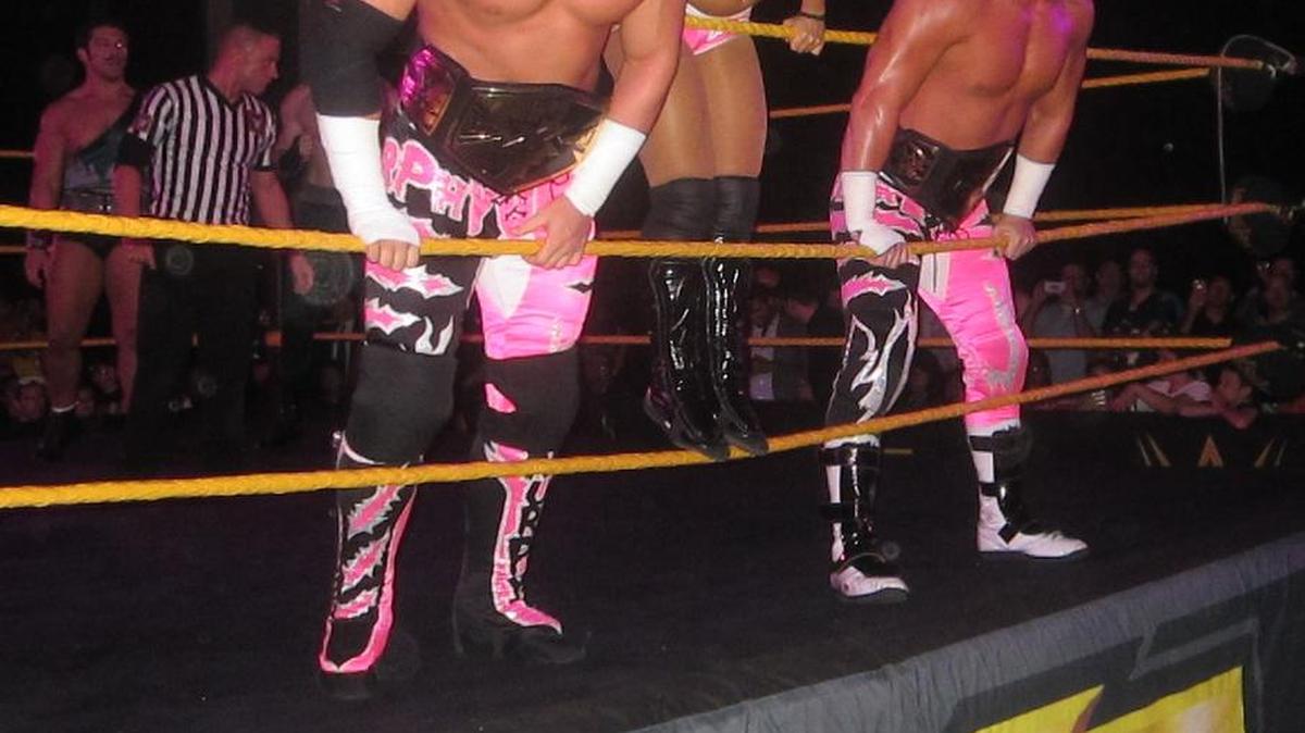 WWE NXT superstar Murphy (left) with Alexa Bliss and Blake during an NXT show at the Fieldhouse at the BankUnited Center at the University of Miami in Coral Gables.