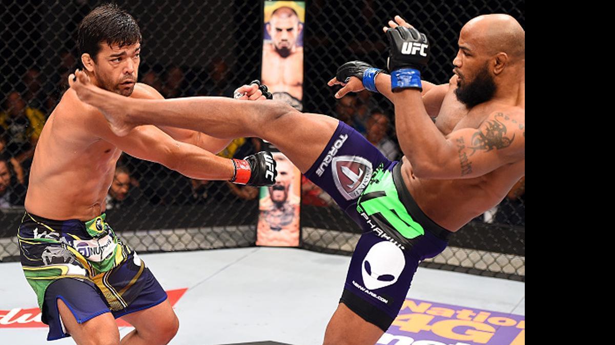 
Miami’s Yoel Romero kicks Lyoto Machida in their middleweight bout during “UFC Fight Night” on June 27 at Hard Rock Live at Seminole Hard Rock Hotel & Casino in South Florida, near Hollywood. Romero, an Olympic wrestling silver medalist, won the bout via knockout. A Cuban defector, Romero trained for the fight at American Top Team Kendall West in Miami.
