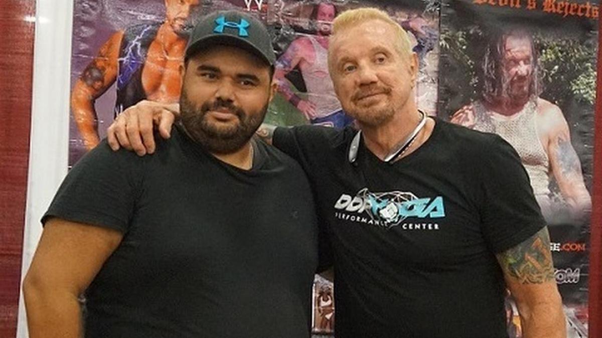 Longtime wrestling fan Reese Beck with Diamond Dallas Page during Florida Supercon July 1-4, 2016 at the Miami Beach Convention Center. Beck lost 15 pounds using DDP Yoga.