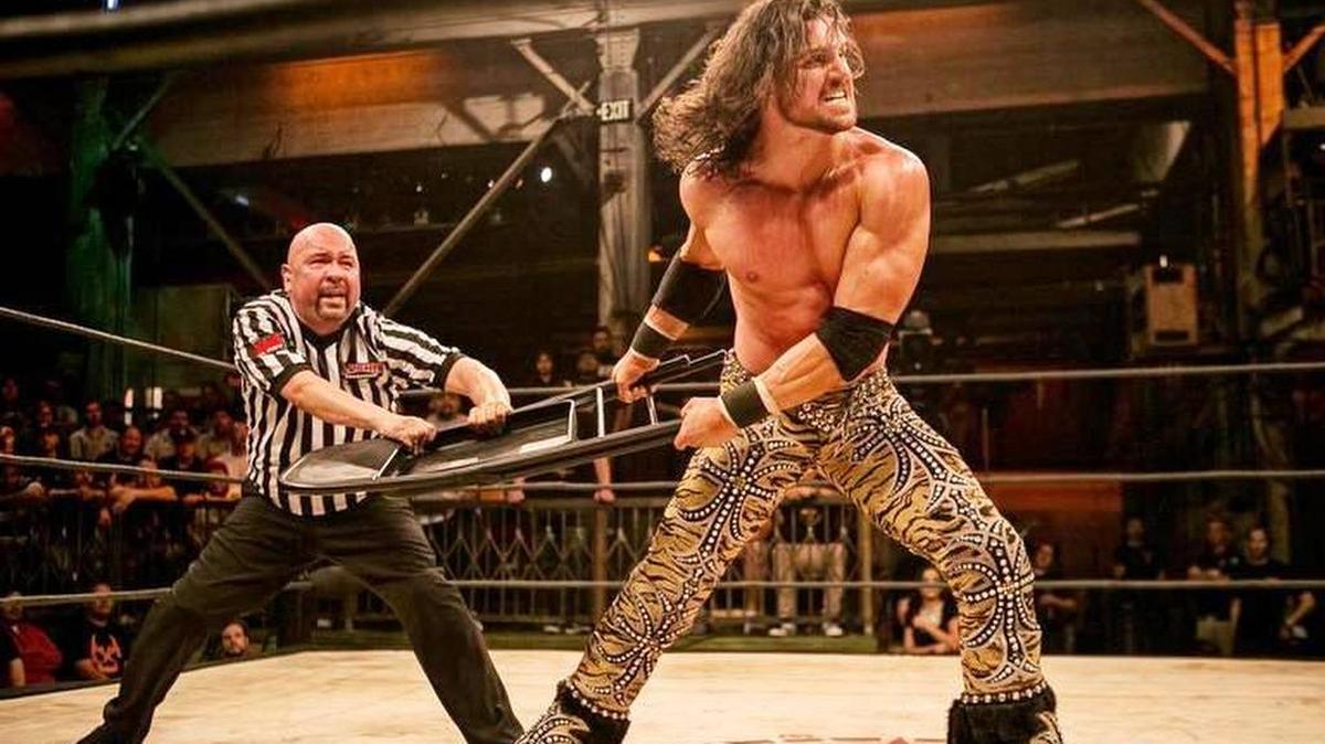 Johnny Impact of GFW is also Johnny Mundo of Lucha Underground and formerly John Morrison of WWE. Your Lucha Underground referee is Marty Elias.