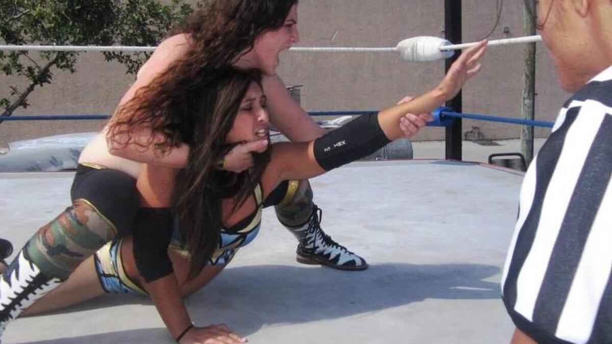 After training at the Storm Wrestling Academy in Calgary, Alberta, Canada, Rachael Ellering (reaching for ropes) moved to Central Florida and worked the Florida indies. As Rachel Evers, she is now competing in the WWE Mae Young Classic, which begins broadcasting Monday, Aug. 28 on the WWE Network. Ellering is pictured in a match against Chelsea Durden at a CCW show in South Florida.