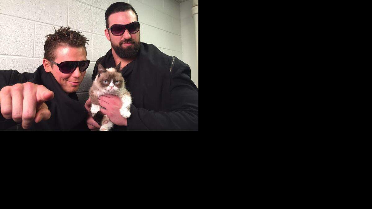 
WWE superstars The Miz and Damien Mizdow with internet sensation Grumpy Cat who guest starred on WWE Monday Night Raw on Nov. 17 on the USA Network.
