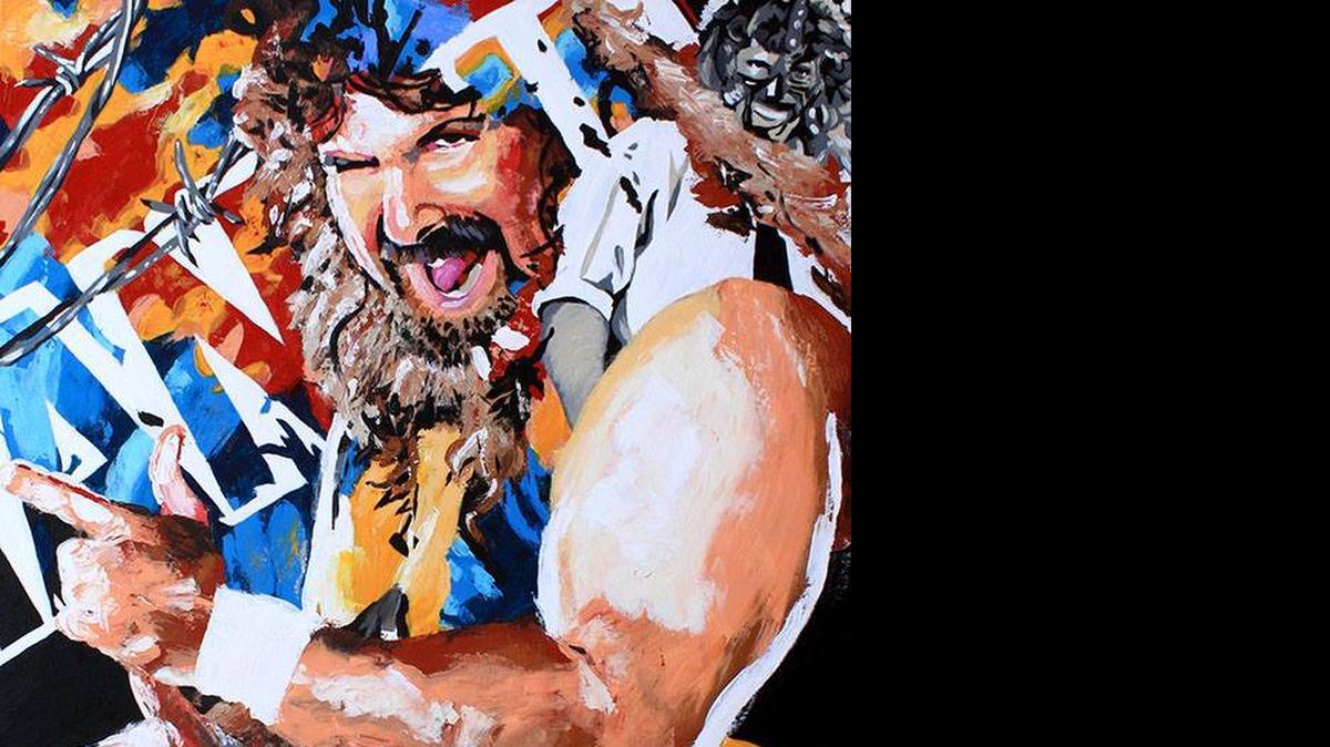 
Artist Rob Schamberger captures WWE Hall of Famer Mick Foley on another canvas. 
