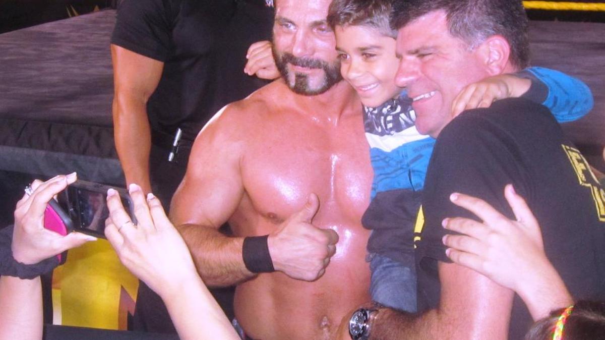Austin Aries signs autographs and poses for photos after main eventing an NXT show on Saturday, June 4 at the Havert L. Fenn Center in Fort Pierce. Aries will battle Shinsuke Nakamura at NXT TakeOver: The End on Wednesday, June 8 on WWE Network from Full Sail Live at Full Sail University in Winter Park, near Orlando.
