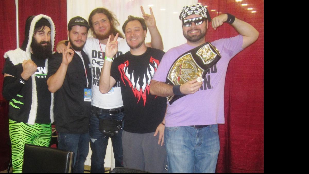 
Fans, staff and wrestlers at the Ronin Pro Wrestling Booth during Florida Supercon June 25-28 at the Miami Beach Convention Center. In its 10th year, Florida Supercon, one of the country’s largest comic convention and pop culture events, returned to Miami Beach to fill fans’ love for comic books, anime, animation, video game, fantasy, Sci-Fi and pop culture genres. The four-day event attracted more than 50,000 people. Visit http://www.roninprowrestling.com and http://floridasupercon.com.
