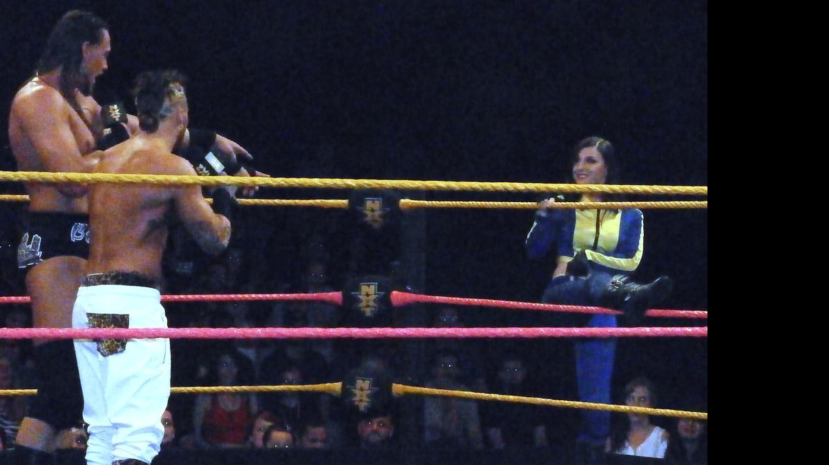 
Leva Bates, known as Blue Pants in WWE NXT, will compete at the Ronin Pro Wrestling show on Saturday, July 25 at the Broward College Gym in (South Florida) Pembroke Pines. Pictured, Blue Pants is introduced by Enzo Amore and Big Cass Colin Cassady during an NXT show at Full Sail Live at Full Sail University in Winter Park, near Orlando.
