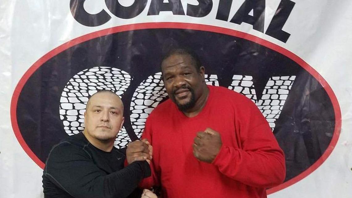 Former undisputed world heavyweight boxing champ Big Daddy Riddick Bowe will train in professional wrestling at the Main Event Training Center in Fort Lauderdale. He is pictured with Coastal Championship Wrestling and Main Event Training Center President/Head Trainer Pablo Marquez.