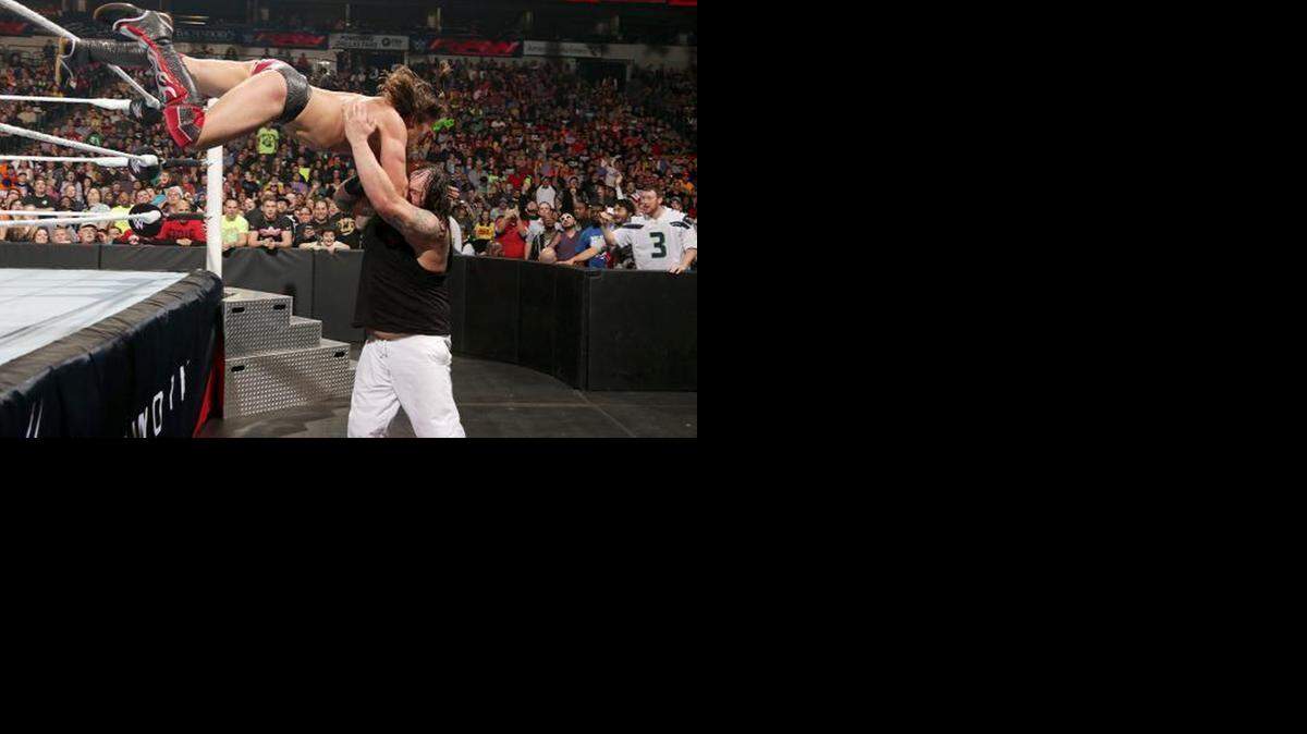 
Daniel Bryan (left) battles Bray Wyatt in his first match on WWE Monday Night Raw since his return.
