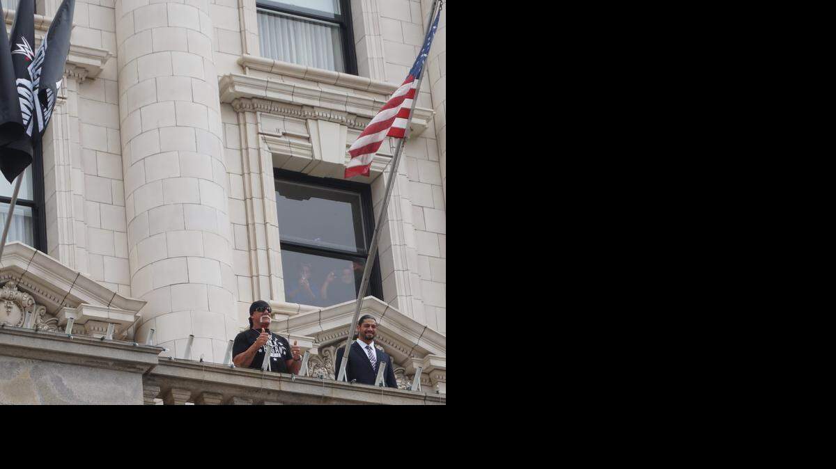 
WWE Hall of Famer Hulk Hogan (left) and WWE superstar Roman Reigns on the balcony of The Fairmont San Francisco, a world-renowned luxury hotel, during a media event on Friday, March 27 to promote WrestleMania 31, which is Sunday, March 29 from Levi’s Stadium, home of the San Francisco 49ers in Santa Clara, Calif.
