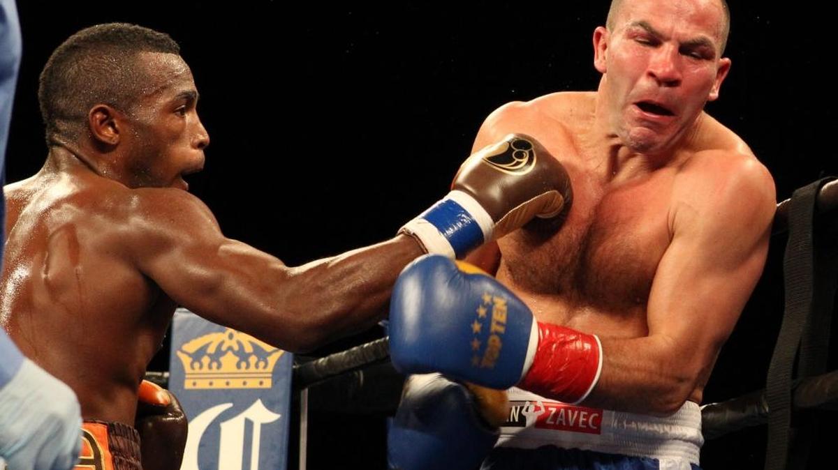 Erislandy Lara lands a punch against Jan Zaveck during their bout Wednesday, Nov. 25, 2015 at Hialeah Park and Casino.