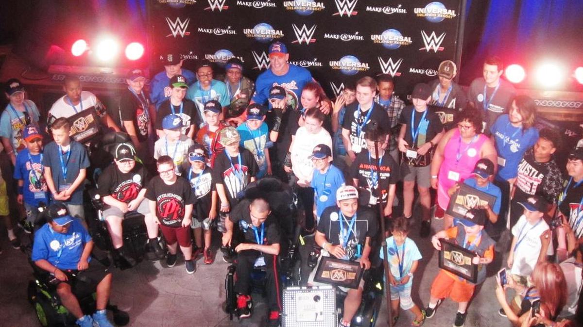 Wish kids group photo with WWE Superstar John Cena during his annual Make-A-Wish Luncheon Party on Saturday, April 1 at Antojitos Authentic Mexican Food Restaurant at Universal Studios Orlando City Walk. Cena inducted 39 wish kids into the WWE Circle of Champions as part of WrestleMania Week.