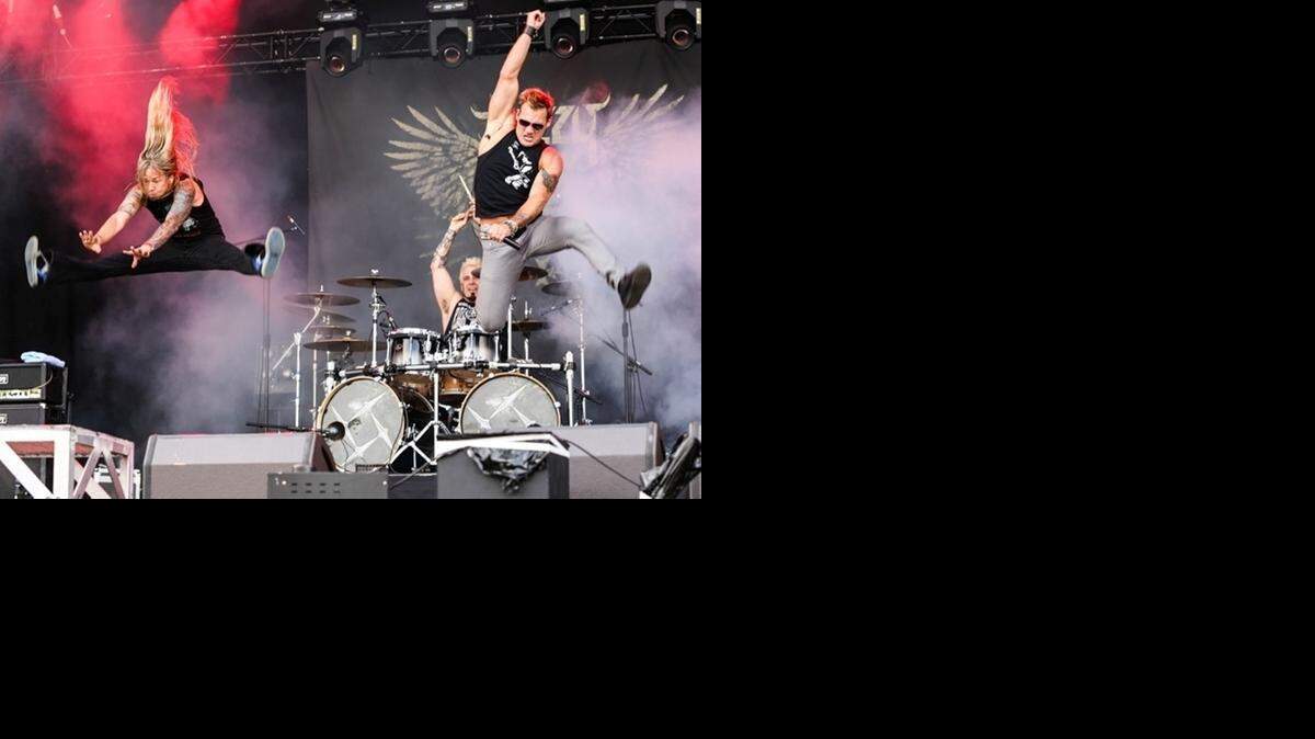 
Chris Jericho (right) rocks out as the lead vocalist of the rock metal band Fozzy. Jericho, also a WWE superstar, will be leading Fozzy when it makes its South Florida debut on Wednesday, Dec. 10 at the Culture Room in Fort Lauderdale.
