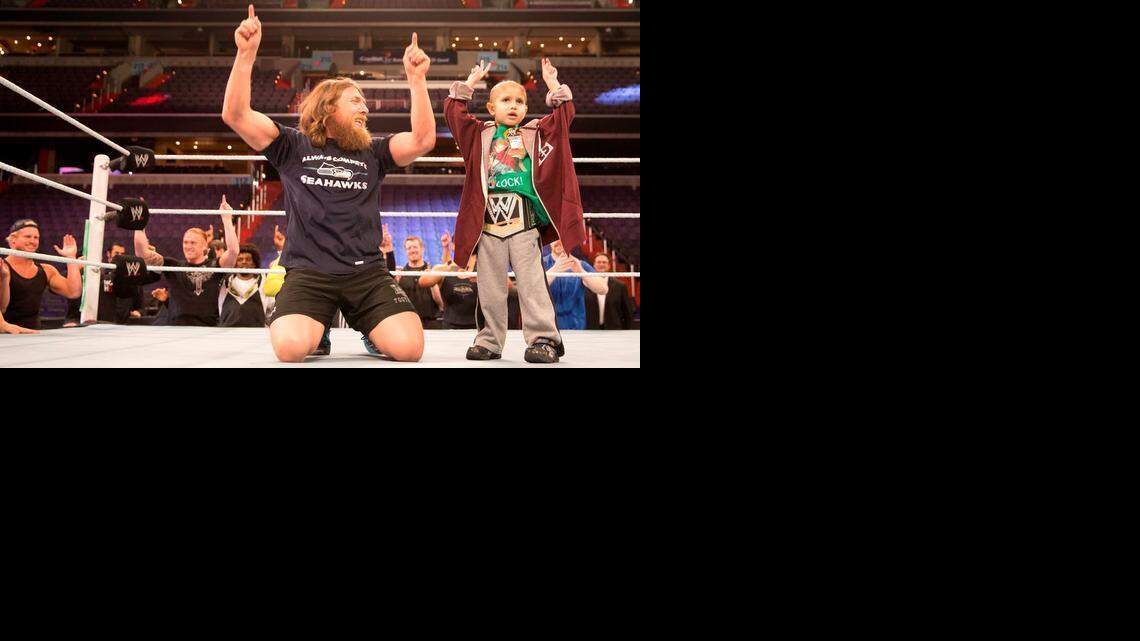 
WWE superstar Daniel Bryan became good friends with Connor Michalek, an inspiration to WWE, the WWE Universe and the world. Connor, a passionate WWE fan who died last year at age 8 from cancer, is the first recipient of The Warrior Award, named after WWE Hall of Famer the Ultimate Warrior. The honor will be bestowed each year at the WWE Hall of Fame Induction Ceremony. With other WWE superstars and divas surrounding the ring, Daniel Bryan and Connor led the ‘Yes’ chants in a special moment.
