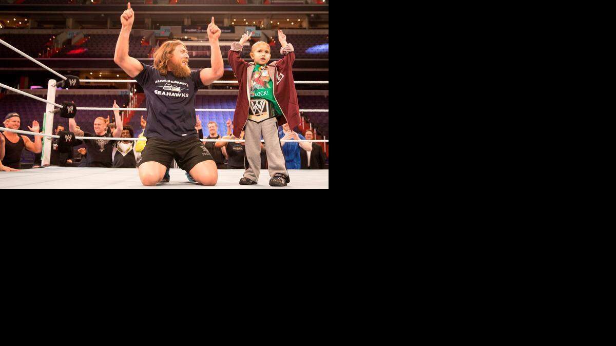 
WWE superstar Daniel Bryan became good friends with Connor Michalek, an inspiration to WWE, the WWE Universe and the world. Connor, a passionate WWE fan who died last year at age 8 from cancer, is the first recipient of The Warrior Award, named after WWE Hall of Famer the Ultimate Warrior. The honor will be bestowed each year at the WWE Hall of Fame Induction Ceremony. With other WWE superstars and divas surrounding the ring, Daniel Bryan and Connor led the ‘Yes’ chants in a special moment.
