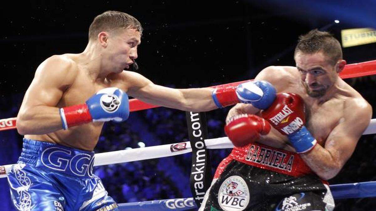 
Gennady Golovkin, left, of Kazakhstan, throws a left jab at Marco Antonio Rubio in the first round during the WBC middleweight title boxing bout Saturday, Oct. 18, 2014, in Carson, Calif. Glolovkin won when the fight was stopped in the second round. 

