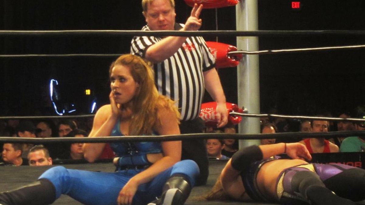 The inspirational Kennadi Brink (left) in a battle with second generation wrestler Rachael Ellering during a Ring of Honor show in October at the War Memorial Auditorium in Fort Lauderdale. Your referee is Todd Sinclair.