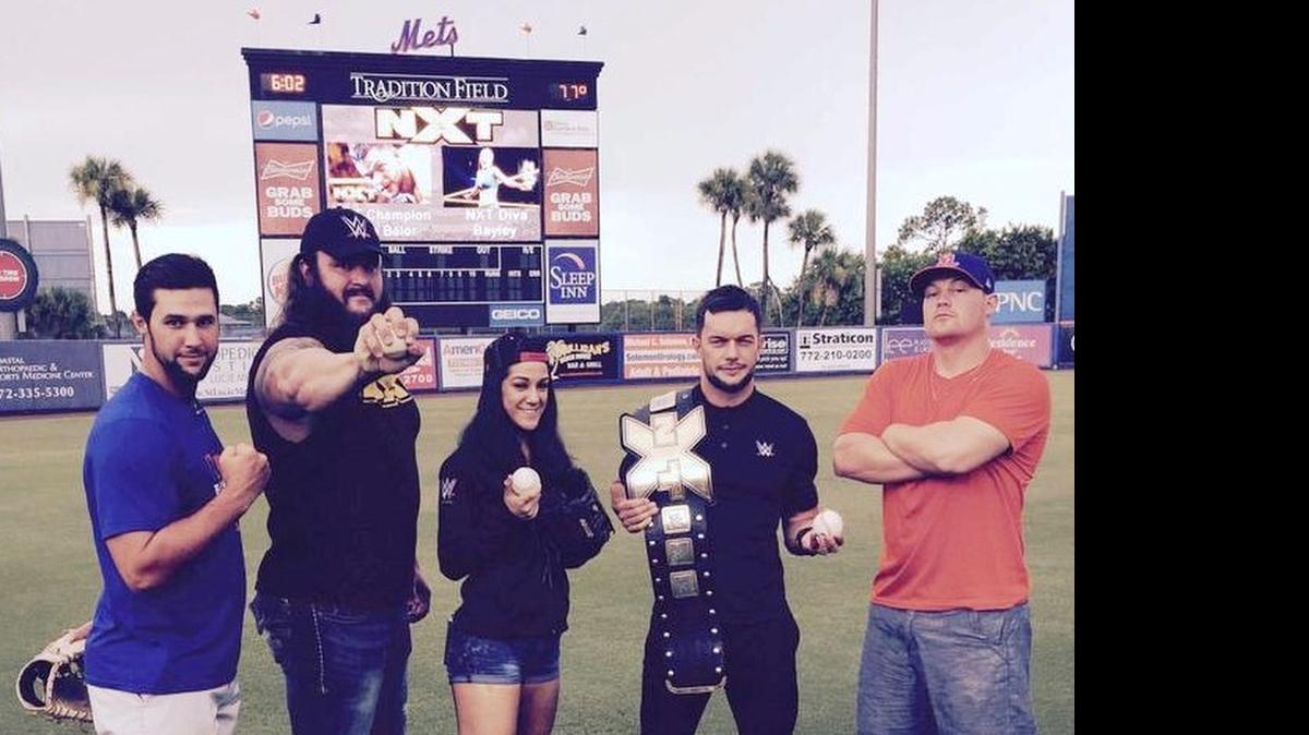 
NXT’s Braun Stowman, Bayley and champ Finn Balor had some fun posing for photos with fans, players, staff at Tradition Field, home of the St. Lucie Mets in Port St. Lucie. Competing in the Florida State League, the St. Lucie Mets are the Class A minor league affiliate of the New York Mets. NXT Day on July 22 at Tradition Field was postponed because of rain.

