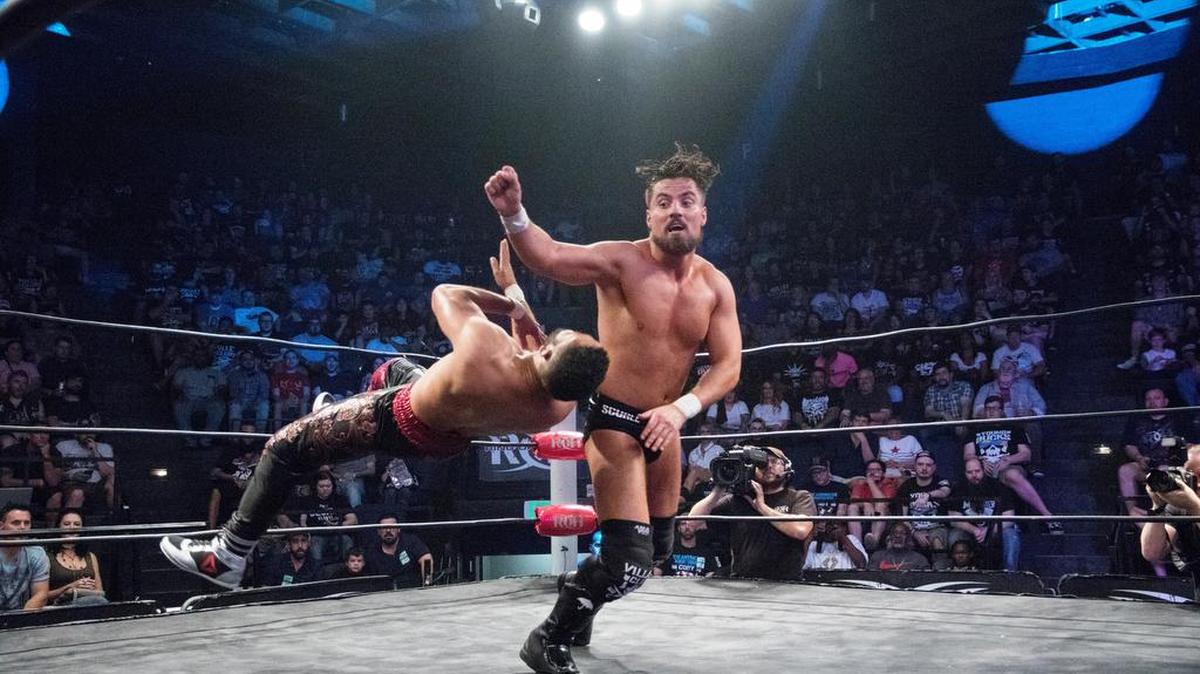 Marty Scurll (delivering clothesline) will be part of Ring of Honor’s Death Before Dishonor pay-per-view on Friday, Sept. 22 in Las Vegas.