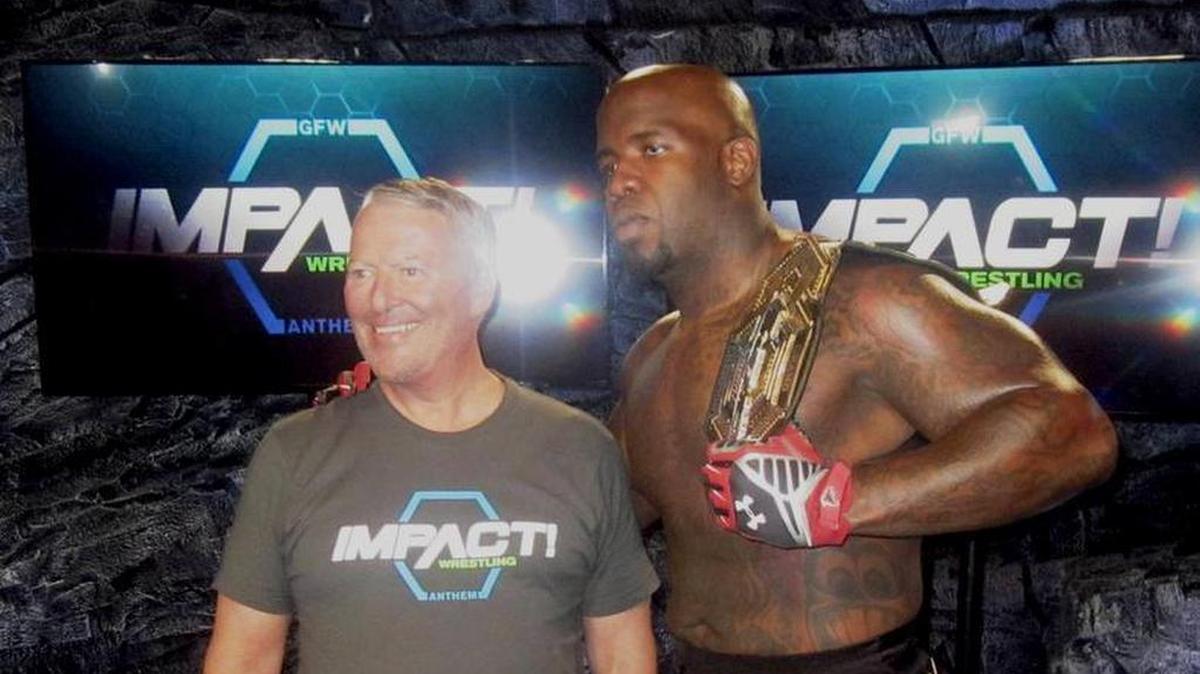 Impact Wrestling wrestler Moose with Orlando Mayor Buddy Dyer at the Impact Zone at Universal Studios Florida in Orlando.