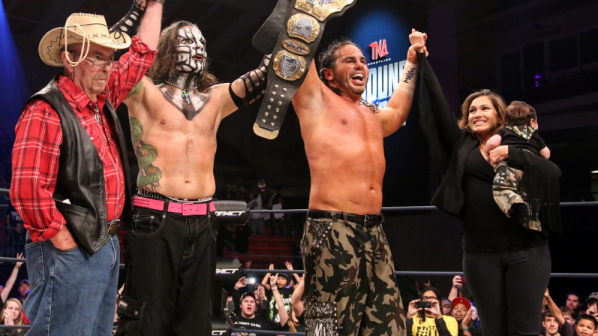 
Matt Hardy (third from left) celebrates in the ring with family after winning the TNA World title in the main event of the TNA Bound for Glory pay-per-view on Sunday, Oct. 4 at the Cabarrus Arena in Concord, N.C., his home state. Also pictured are his father, Gilbert; brother, Jeff; wife, Rebecca ‘Reby Sky’ Reyes; and their 3-month-old son, Maxel.

