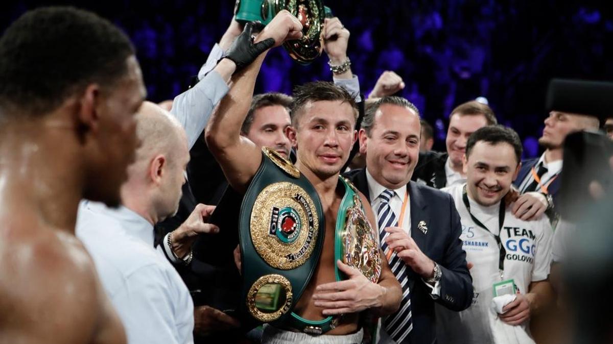 Gennady Golovkin, of Kazakhstan, celebrates after winning a middleweight boxing match against Daniel Jacobs, left, on Sunday, March 19, 2017, in New York.